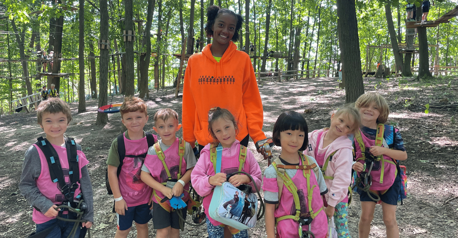Kids climbing during TreeRunner Fall Break Adventure Camp at Grand Park in Westfield Indiana